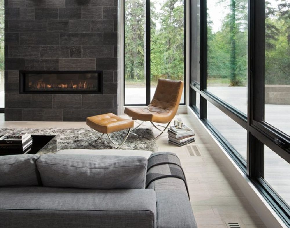 Chair in front of fireplace resized